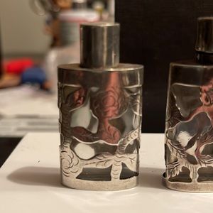 Vintage glass sterling silver perfume bottles .These bottle are sold separately